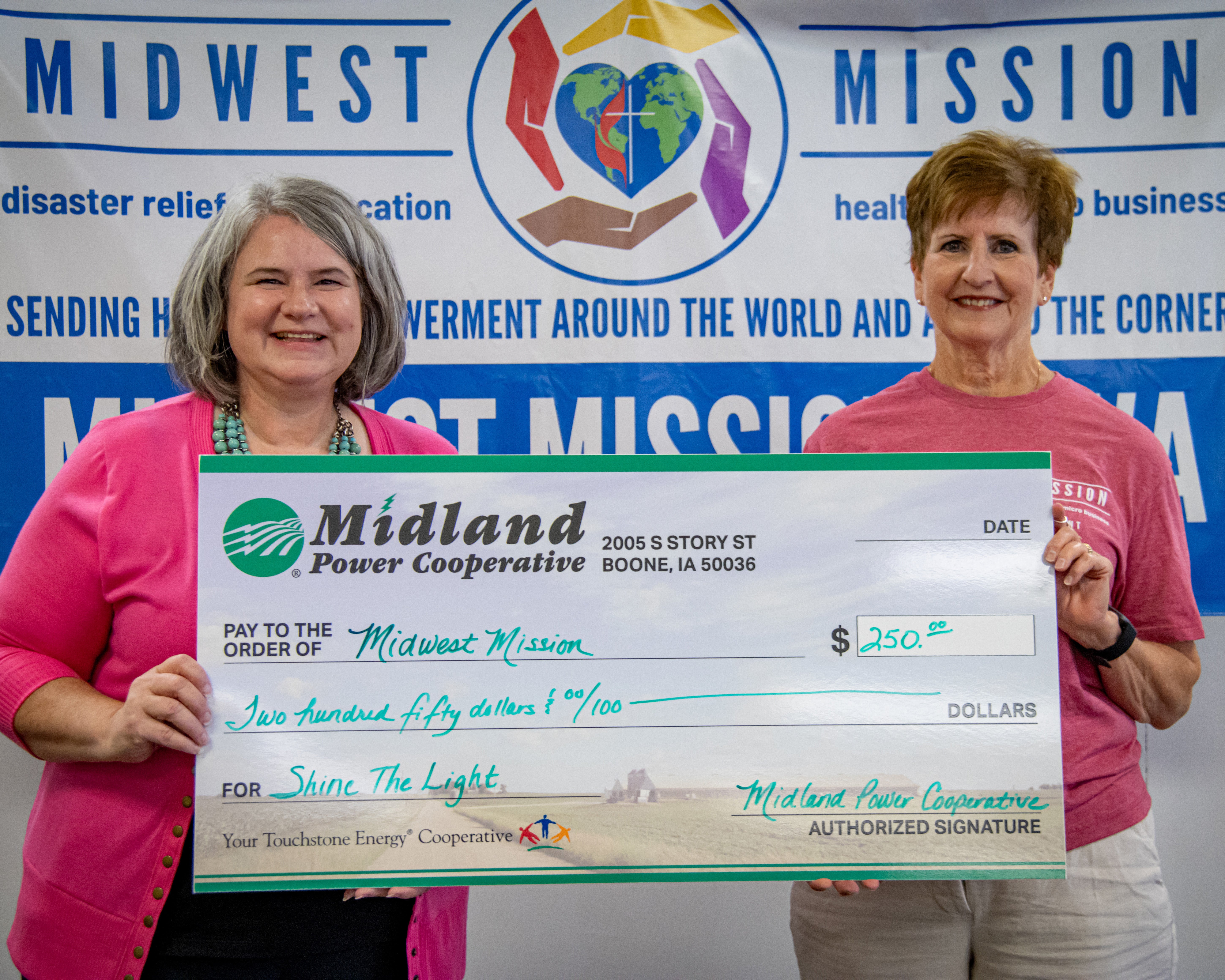 Midland member Danille Curtis and Midwest Mission Distribution Center volunteer Vicki Tronchetti.